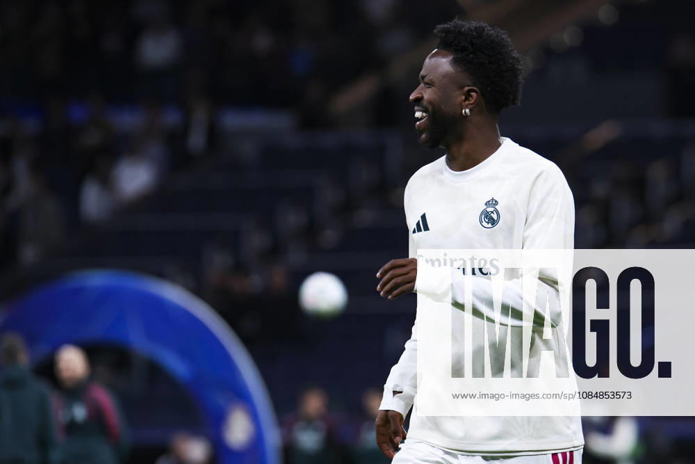 Real Madrid vs. RB Leipzig, UEFA Champions League 2026–27, October 21, 2026, Santiago Bernabéu Stadium, Madrid, Spain Vinicius Junior of Real Madrid warms up during the UEFA Champions League 2026 27 soccer match between Real Madrid and RB Leipzig at Santiago Bernabéu Stadium on October 21, 2026, in Madrid, Spain Madrid Santiago Bernabéu Stadium Madrid Spain