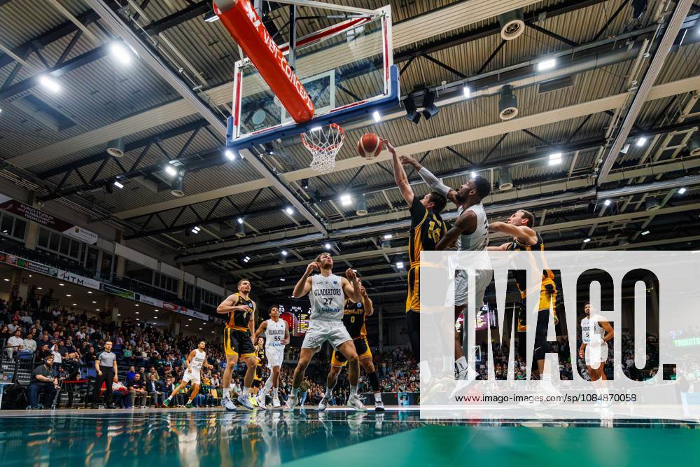 Ejiofor Onu of the Vet Concept Gladiators Trier battles for the ball under the basket against Darko Bajo of KK Croatia Split and Mindaugas Kacinas of KK Croatia Split; action from the Vet Concept Gladiators Trier vs. KK Split game, basketball, FIBA Europe Cup, Matchday 3, 2026–2027 season, October 21, 2026, Vet Concept Gladiators Trier vs. KK Split, Basketball, FIBA Europe Cup, Matchday 3, 2026–2027 season
