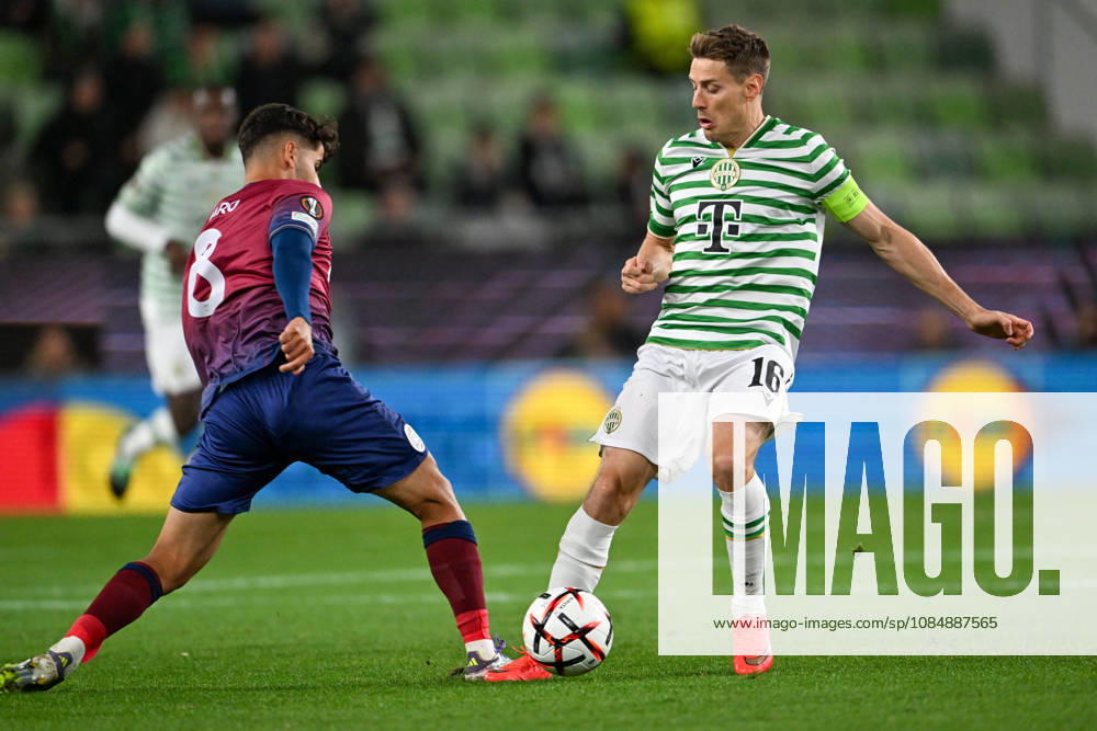 IPA90039005 - Zachariassen Kristoffer (Ferencvarosi TC) in action against Alejandro Alfaro (SCU Torreense) during Matchday 3 of the UEFA Europa League, in the match between Ferencvaros T.C. and SCU Torreense on October 22, 2026, at Ferencvaros Stadion, Budapest, Hungary