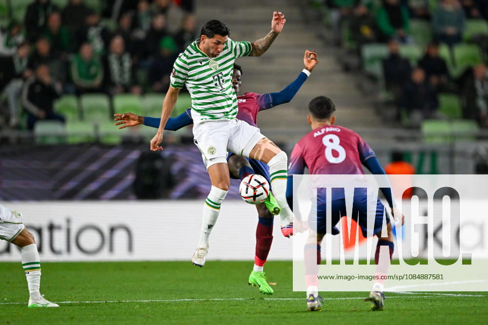 IPA90039011 - Musa Drj (SCU Torreense) in action against Gomez Mariano (Ferencvarosi TC) during Matchday 3 of the UEFA Europa League, in the match between Ferencvaros T.C. and SCU Torreense on October 22, 2026, at Ferencvaros Stadion in Budapest, Hungary