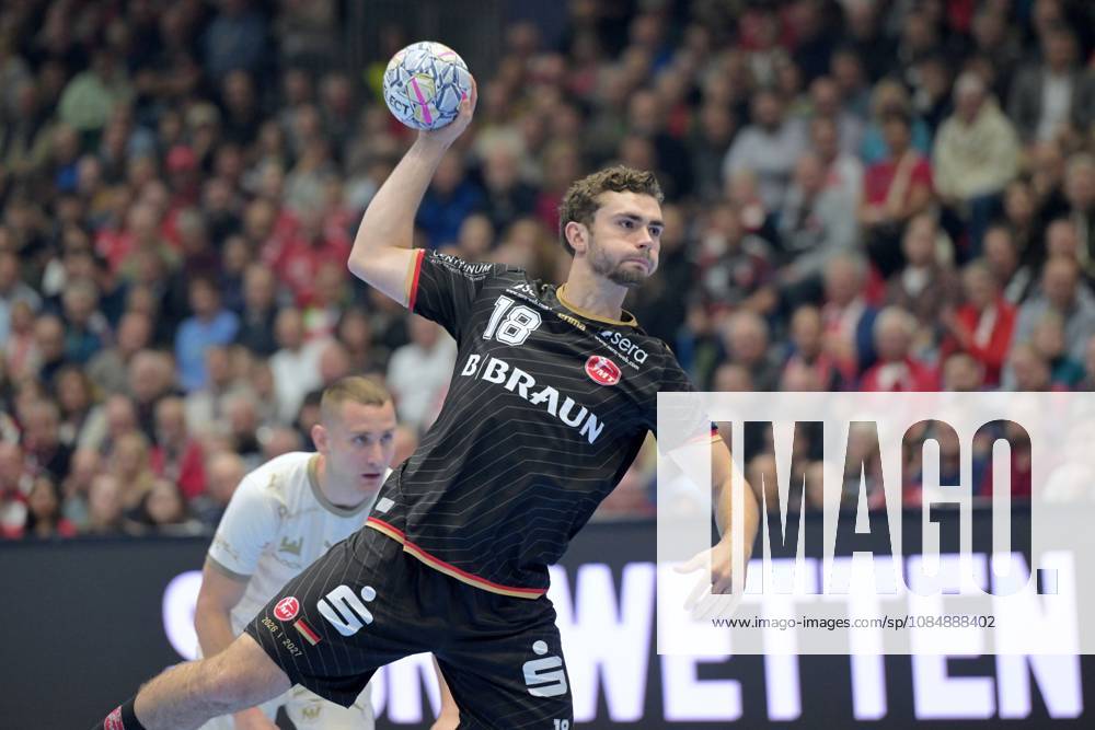 Florian Drosten (MT Melsungen 18) takes a shot; Michal Daszek (Wisla Plock 3) is in the background, GER, MT Melsungen vs. Orlen Wisla Plock (POL), Handball, Men s Champions League, Group Matches, 2026–2027 Season, October 22, 2026, GER, MT Melsungen vs. Orlen Wisla Plock, Men s Champions League, Group Match, 2026–2027 Season, October 22, 2026, Kassel