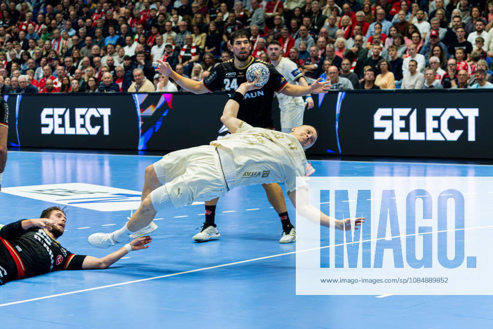 EHF Champions League 2026–2027 Group Stage Group B Match 5 MT Melsungen vs. Orlen Wisla Plock Pictured: Dawid Dawydzik (SPR) taking a shot at the Rothenbach Halle in Hesse