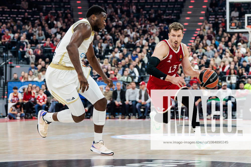 Andreas Andi Obst (FC Bayern Muenchen, 13) controls the ball against Mfiondu Kabengele (Dubai Basketball, 17) during the Turkish Airlines EuroLeague match between FC Bayern Muenchen vs. Dubai Basketball at SAP Garden on round 7 of Turkish Airlines EuroLeague on October 22, 2026 in Munich, Germany. Bavaria Germany
