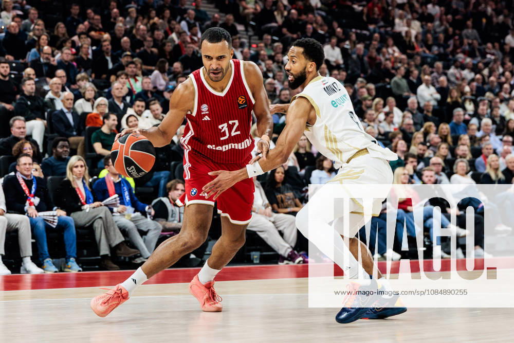 Johannes JT Thiemann (FC Bayern Muenchen, 32) controls the ball against Davis Bertrans (Dubai Basketball, 8) during the Turkish Airlines EuroLeague match between FC Bayern Muenchen vs. Dubai Basketball at SAP Garden on round 7 of Turkish Airlines EuroLeague on October 22, 2026 in Munich, Germany. Bavaria Germany