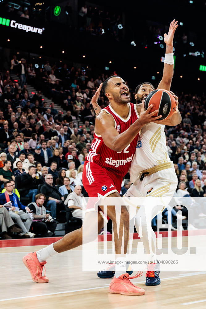 Johannes JT Thiemann (FC Bayern Muenchen, 32) controls the ball against Davis Bertrans (Dubai Basketball, 8) during the Turkish Airlines EuroLeague match between FC Bayern Muenchen vs. Dubai Basketball at SAP Garden on round 7 of Turkish Airlines EuroLeague on October 22, 2026 in Munich, Germany. Bavaria Germany
