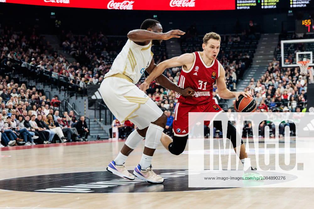 Rokas Jokubaitis (FC Bayern Muenchen, 31) controls the ball against Mfiondu Kabengele (Dubai Basketball, 17) during the Turkish Airlines EuroLeague match between FC Bayern Muenchen vs. Dubai Basketball at SAP Garden on round 7 of Turkish Airlines EuroLeague on October 22, 2026 in Munich, Germany. Bavaria Germany