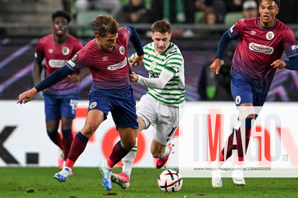 IPA90041854 - Mariusz Corbu (Ferencvarosi TC) in action against Joao Marques (SCU Torreense) during Matchday 3 of the UEFA Europa League, in the match between Ferencvaros T.C. and SCU Torreense on October 22, 2026, at Ferencvaros Stadion, Budapest, Hungary