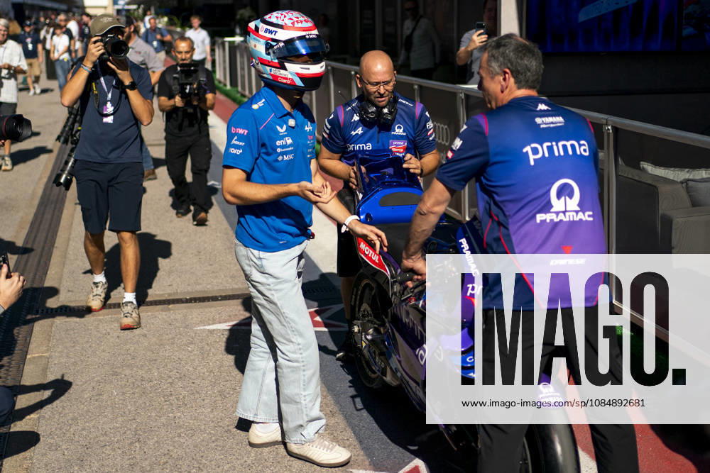 Argentine Formula One driver Franco Colapinto of Alpine F1 Team speaks to mechanics after riding a Prima Pramac Yamaha MotoGP Team bike in the paddock during the Formula One United States Grand Prix at the Circuit of the Americas in Austin, Texas on Thursday, October 22, 2026. AUS2026102211 GREGxNASH