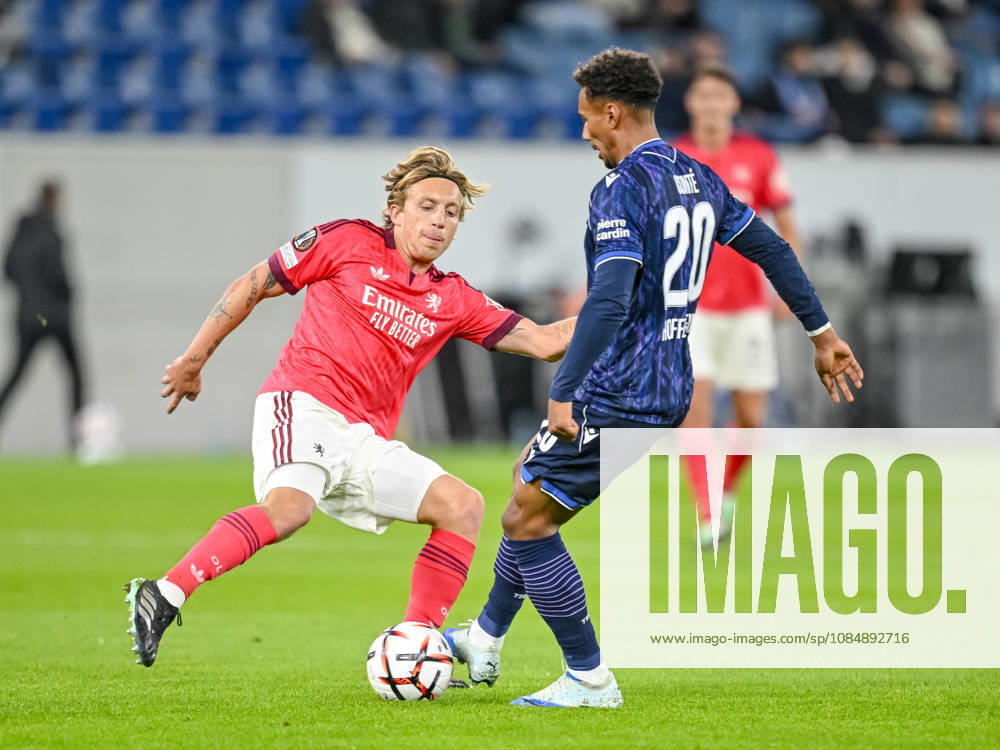 Mads Bidstrup of Olympique Lyon and Bambase Conte of TSG 1899 Hoffenheim battle for the ball during the UEFA Europa League 2026-27 group stage match between TSG 1899 Hoffenheim and Olympique Lyonnais at the Rhein-Neckar Arena on October 22, 2026 in Sinsheim, Germany. Photo by Harry Langer, DeFodi Images