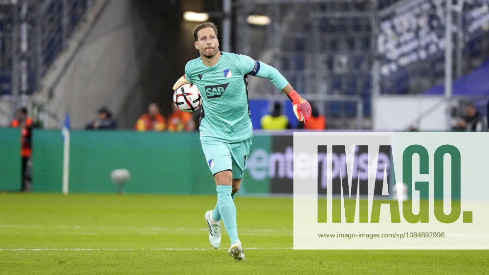 Oliver Baumann, Goalkeeper, Hoffenheim, No. 1, Captain, on the ball, cropped, full-body, single image, single photo, action, October 22, 2026, Sinsheim, Germany, soccer, UEFA Europa League, TSG 1899 Hoffenheim vs. Olympique Lyon, DFB and DFL regulations prohibit any use of photographs as image sequences and or quasi-video