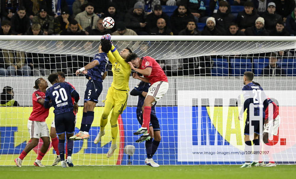 Penalty area play, Goalmouth action: Goalkeeper Dominik Greif (Olympique Lyon 01) is injured during a header duel; tackle involving Felix Bacher (Olympique Lyon 20) and Ozan Kabak (TSG 1899 Hoffenheim 05); TSG 1899 Hoffenheim vs. Olympique Lyon 22 10 2026 DFL REGULATIONS PROHIBIT ANY USE OF PHOTOGRAPHS AS IMAGE SEQUENCES AND OR QUASI-VIDEO TSG 1899 Hoffenheim vs. Olympique Lyon