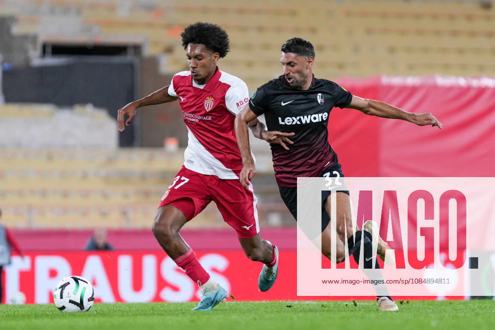 Edan Diop (AS Monaco, 37) in a tackle with Vincenzo Grifo (SC Freiburg, 32), Monaco, soccer, UEFA Conference League, Matchday 2, group stage, 2026–2027, AS Monaco vs. SC Freiburg, October 22, 2026, Stade Louis II, Monaco, Monaco, Stade Louis II, Fontvieille, Monaco