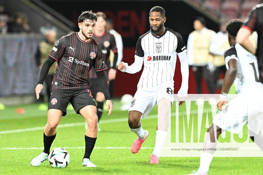 Midtjylland s Mads Bech Sorensen and STVV s Abdoulaye Sissako pictured in action during a soccer game between Danish FC Midtjylland and Belgian Sint-Truidense VV, Thursday 22 October 2026 in Herning, Denmark, on the second day of the UEFA Conference League league phase. JILLxDELSAUX x190691990x