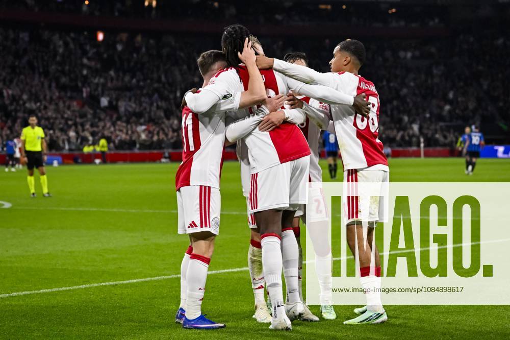 AMSTERDAM - (lr) Viktor Tsyhankov of Ajax, Tolu Arokodare of Ajax, Lucas Rosa of Ajax and Abdellah Ouazane of Ajax celebrate Tolu Arokodare s 1-0 during the UEFA Conference League match between AFC Ajax and Atalanta BC at the Johan Cruijff ArenA on 22 October 2026 in Amsterdam, the Netherlands. OLAF KRAAK ANP UEFA Conference League 2026 27 ANPxSportx IVx 573305466 originalFilename: 573305466