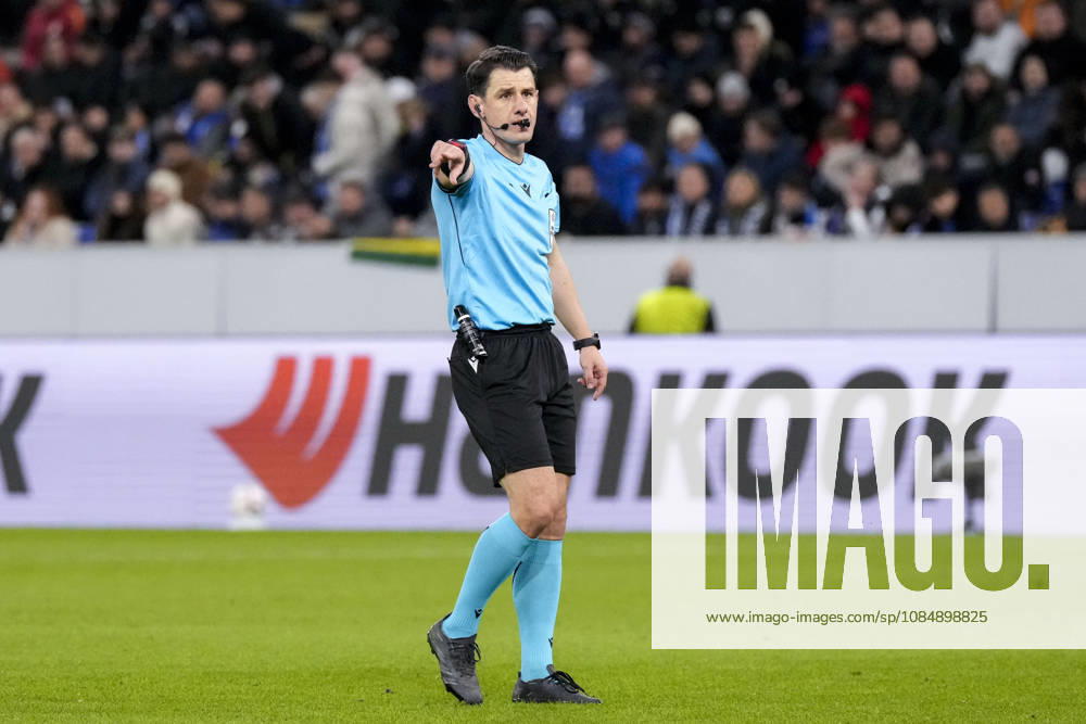 Halil Umut Meler, referee, Turkey, giving instructions, gesturing, gesturing with his arms, cutout, full-body, single frame, single photo, action, October 22, 2026, Sinsheim, Germany, soccer, UEFA Europa League, TSG 1899 Hoffenheim vs. Olympique Lyon, DFB and DFL regulations prohibit any use of photographs as image sequences and or quasi-video