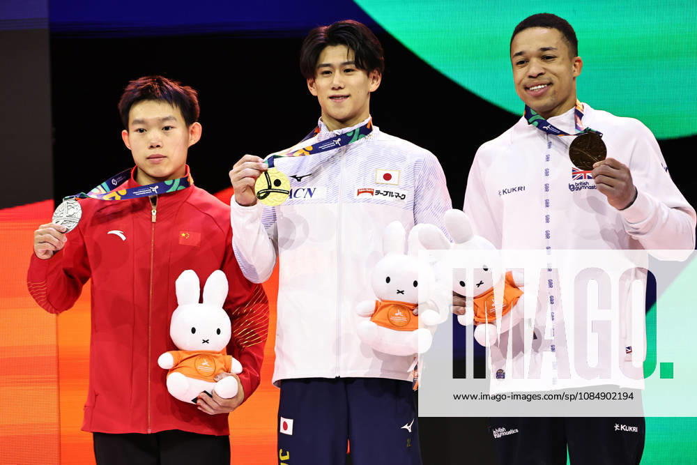 Winners Yang Haonan (CHN), Daiki Hashimoto (JPN), and Joe Fraser (GBR) after the all-around final at the 2026 World Championships in Rotterdam on October 22, 2026