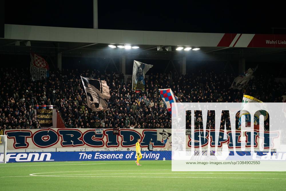 THUN, BERN - OCTOBER 22: Fans of HNK Hajduk Split wave flags during the UEFA Conference League match between FC Thun and HNK Hajduk Split at VISANA STADION on October 22, 2026 in Thun, Bern, Switzerland.