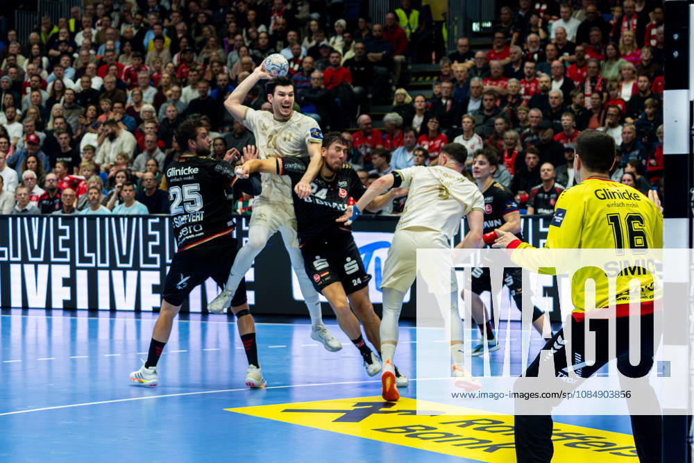 EHF Champions League 2026–2027 Group Stage Group B Match 5 MT Melsungen vs. Orlen Wisla Plock Pictured, from left, in a one-on-one battle: Olle Forsell Schefvert (MT), Gergo Fazekas (SPR) and Daniel Dujshebaev (MT) at the Rothenbach Hall in Hesse