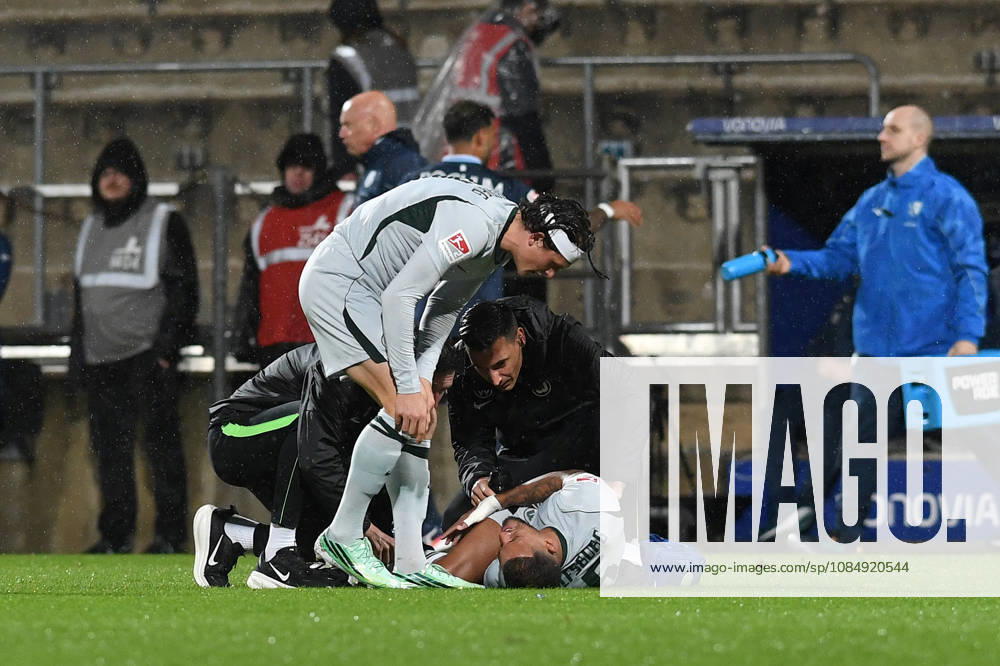 Vini Souza of VfL Wolfsburg lies injured on the field during the 2. Bundesliga match between VfL Bochum and VfL Wolfsburg, Vonovia Ruhrstadion on October 23, 2026, in Bochum, Germany. Photo by Ralf Treese, DeFodi Images. Vini Souza of VfL Wolfsburg is injured during the 2nd Bundesliga match between VfL Bochum and VfL Wolfsburg at Vonovia Ruhrstadion on October 23, 2026 in Bochum, Germany. Photo by Ralf Treese, DeFodi Images. DFB and DFL regulations prohibit any use of photographs as image sequences and or quasi-video. Photo by Ralf Treese, DeFodi Images.
