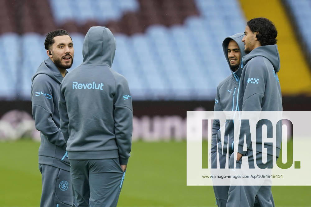 Birmingham, England, 24th October 2026. Rayan Cherki (L) of Manchester City walks on the pitch ahead of the Aston Villa vs Manchester City Premier League match at Villa Park, Birmingham. Picture credit should read: Andrew Yates Sportimage . SPI_001_AY_Villa_Man_City SPI-5099-0001