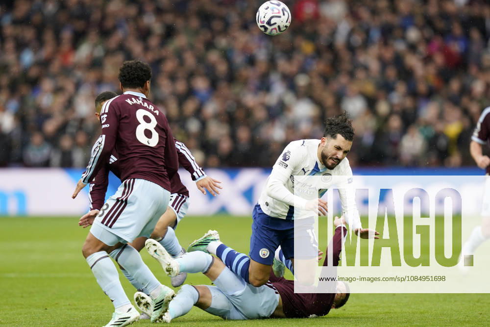 Birmingham, England, 24th October 2026. Rayan Cherki of Manchester City is tackled by Alysson Edward of Aston Villa during the Aston Villa vs Manchester City Premier League match at Villa Park, Birmingham. Picture credit should read: Andrew Yates Sportimage . SPI_029_AY_Villa_Man_City SPI-5099-0029