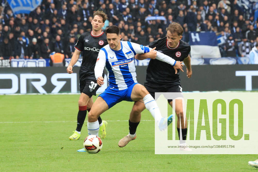 Germany, Soccer, 2. Bundesliga, Matchday 9, 2026–2027 Season, Berlin Olympic Stadium, Hertha BSC vs. Arminia Bielefeld, Josip Brekalo (Hertha BSC Berlin 7), Felix Hagmann (Arminia Bielefeld 2). DFB and DFL regulations prohibit any use of photographs as image sequences and or quasi-video. nordphoto GmbH, Engler, Berlin, Berlin Olympic Stadium, Berlin, Germany