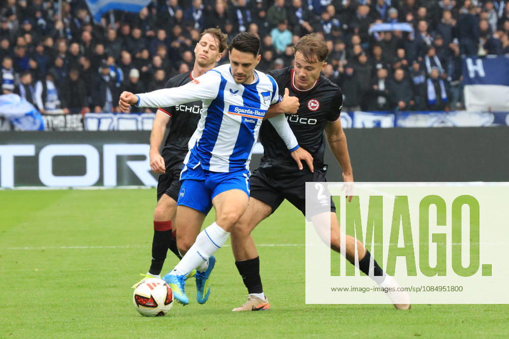 Germany, Soccer, 2. Bundesliga, Matchday 9, 2026–2027 Season, Berlin Olympic Stadium, Hertha BSC vs. Arminia Bielefeld, Josip Brekalo (Hertha BSC Berlin 7), Felix Hagmann (Arminia Bielefeld 2). DFB and DFL regulations prohibit any use of photographs as image sequences and or quasi-video. nordphoto GmbH, Engler, Berlin, Berlin Olympic Stadium, Berlin, Germany