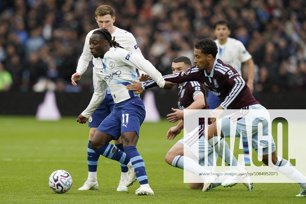 Birmingham, England, 24th October 2026. Jeremy Doku of Manchester City is challenged by Boubacar Kamara of Aston Villa during the Aston Villa vs Manchester City Premier League match at Villa Park, Birmingham. Picture credit should read: Andrew Yates Sportimage . SPI_040_AY_Villa_Man_City SPI-5099-0040
