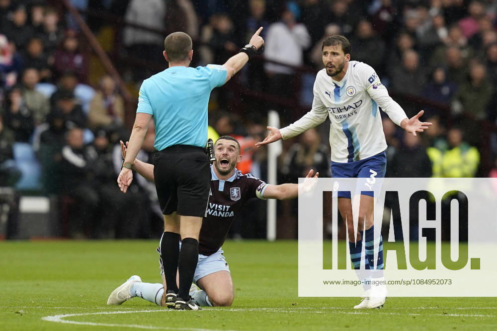 Birmingham, England, 24th October 2026. John McGinn of Aston Villa and Ruben Dias of Manchester City appeal to referee Peter Bankes during the Aston Villa vs Manchester City Premier League match at Villa Park, Birmingham. Picture credit should read: Andrew Yates Sportimage . SPI_041_AY_Villa_Man_City SPI-5099-0041