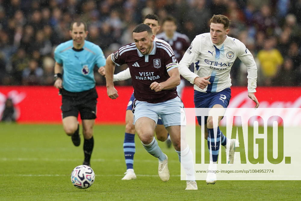 Birmingham, England, 24th October 2026. John McGinn of Aston Villa breaks away from Elliot Anderson of Manchester City during the Aston Villa vs Manchester City Premier League match at Villa Park, Birmingham. Picture credit should read: Andrew Yates Sportimage . SPI_042_AY_Villa_Man_City SPI-5099-0042