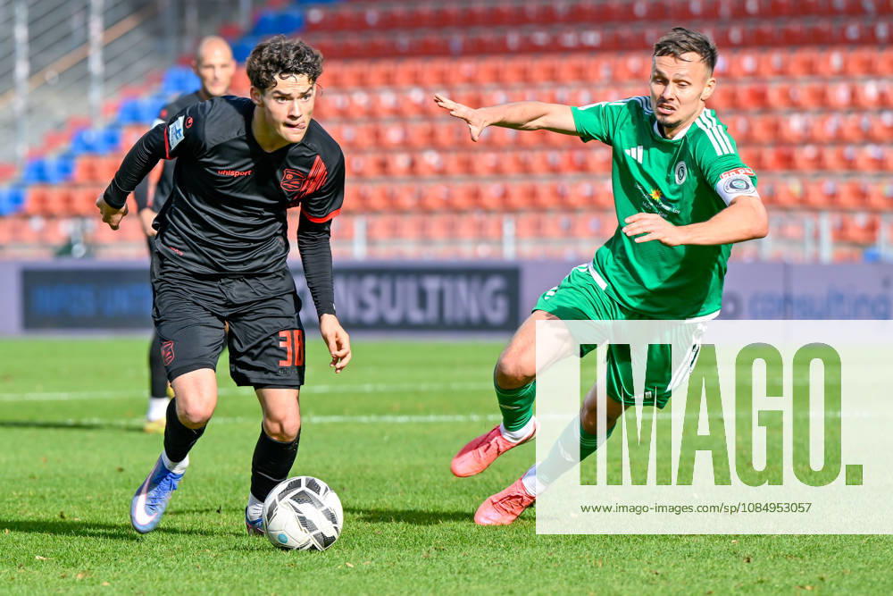 From left: Constantin Strunz (Unterhaching), 38; Tobias Dietrich (Ansbach), 6; in a one-on-one battle, duel, tackle; dynamic, action, 24, 10, 2026, Unterhaching, Germany, soccer, Bavarian Regional League, SpVgg Unterhaching vs. SpVgg Ansbach
