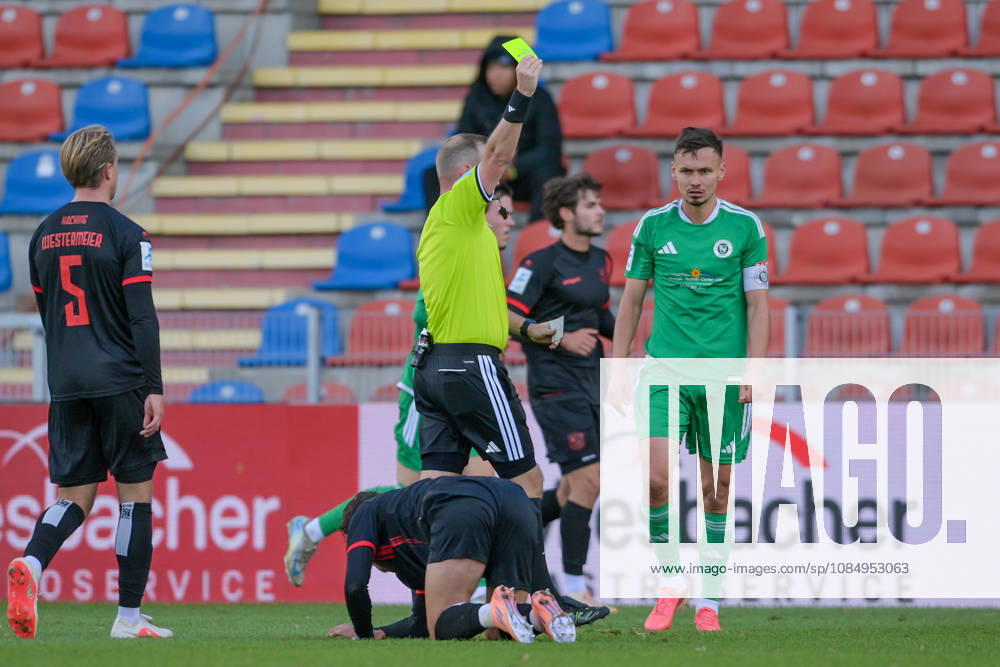 Referee Stefan Treiber shows Tobias Dietrich (Ansbach, 6) a yellow card, 10 24 2026, Unterhaching, Germany, soccer, Bavarian Regional League, SpVgg Unterhaching vs. SpVgg Ansbach