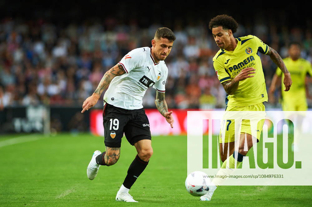 Dani Raba of Valencia CF and Tajon Buchanan of Villarreal CF during the LaLiga EA Sports match between Valencia CF and Villarreal CF at Mestalla on October 24, 2026, in Valencia, Spain