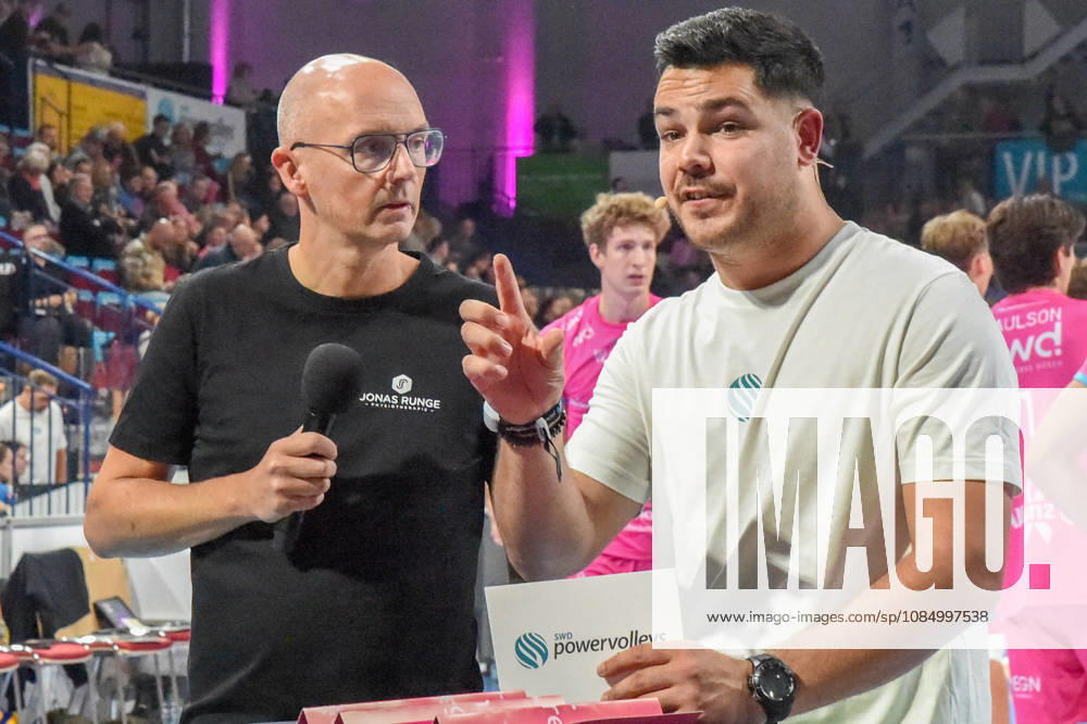 From left: Christophe Achten, Head Coach of the Powervolleys Düren; Philipp Ferebauer, arena announcer, during an interview; TV, television, microphone; October 24, 2026; Düren, Germany; volleyball; Men s Bundesliga 1; regular season; SWD Powervolleys Düren vs. WWK Volleys Munich