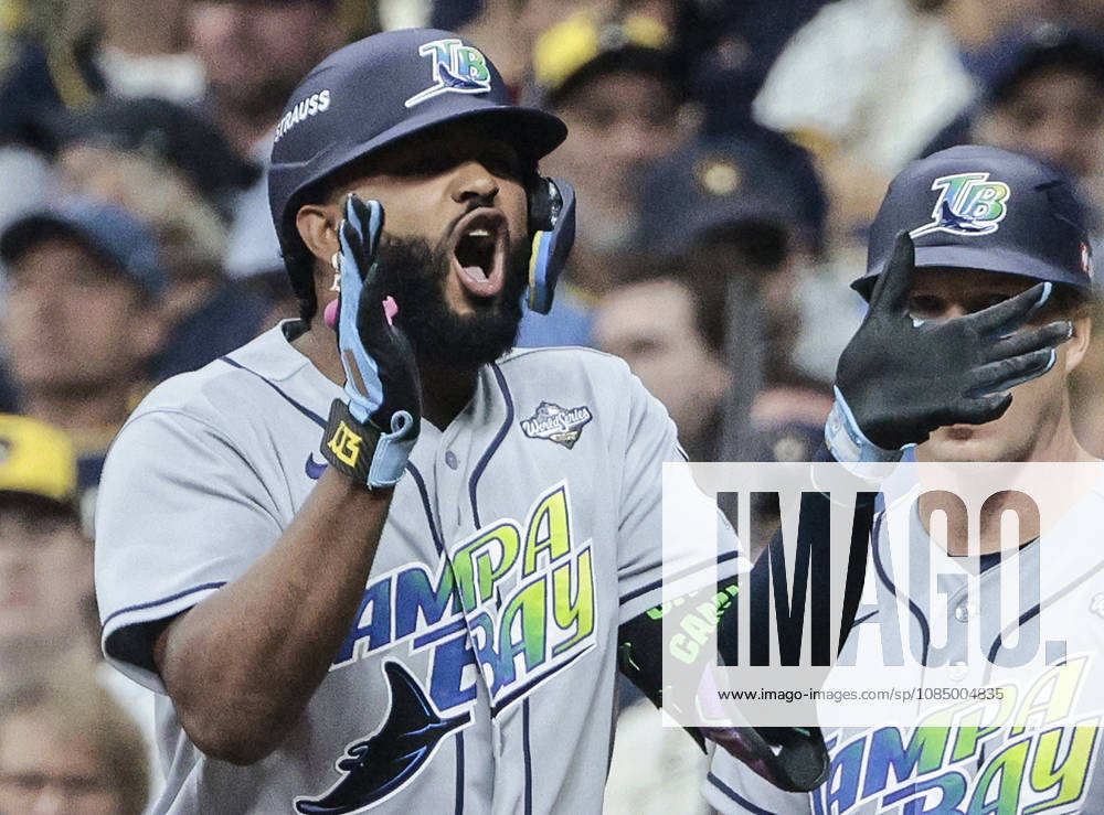 Tampa Bay Rays Junior Caminero (13) celebrates on first base after hitting an rbi-single against the Milwaukee Brewers in the first inning during game two of the 2026 MLB, Baseball Herren, USA World Series at American Family Field in Milwaukee, Wisconsin, on Saturday, October 24, 2026. MIL20261024711 TANNENxMAURY