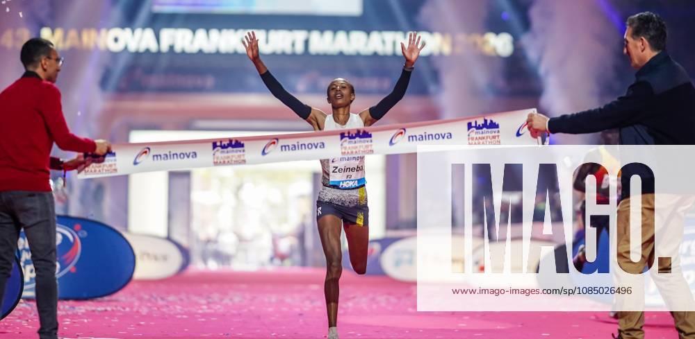 Ethiopian Zeineba Yimer Wins the Mainova Frankfurt Marathon in 2:19:45:25:10:26—A Triumphant Finish at the Festhalle. Zeineba Yimer of Ethiopia wins the women’s race at the Mainova Frankfurt Marathon with a winning time of 2:19:45 hours Frankfurt Festhalle Hesse Germany JRW02157