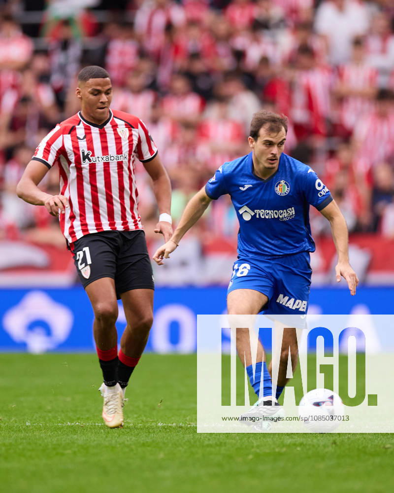 Maroan Sannadi Harrouch of Athletic Club competes for the ball with Francho Serrano of Getafe CF during the LaLiga EA Sports match between Athletic Club and Getafe CF at San Mames on October 25, 2026, in Bilbao, Spain. Bilbao SPAIN - ZUMAa181 20261025_zaa_a181_018