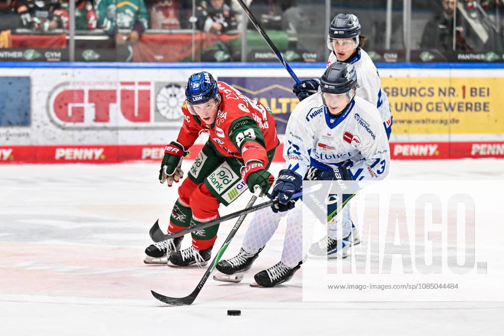 Penny DEL: Augsburger Panther vs. Straubing Tigers, October 25, 2026, AUGSBURG, GERMANY, OCTOBER 25: Jimmy LAMBERT of the Augsburger Panther (23) and Mario ZIMMERMANN of the Straubing Tigers (13) face off during the Penny DEL match between the Augsburger Panther and the Straubing Tigers on Matchday 12 at Curt Frenzel Stadium