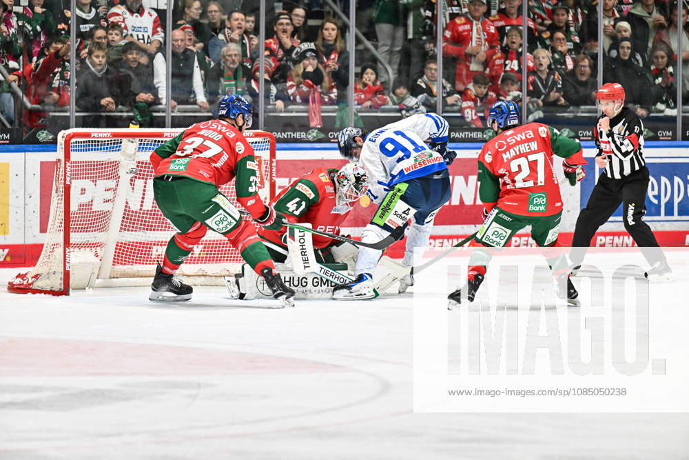 Penny DEL: Augsburger Panther vs. Straubing Tigers, October 25, 2026, AUGSBURG, GERMANY, OCTOBER 25: Peyton JONES of the Augsburger Panther (No. 41) and Hudson ELYNUIK of the Straubing Tigers (No. 91) face off during the Penny DEL match between the Augsburger Panther and the Straubing Tigers on Matchday 12 at Curt Frenzel Stadium