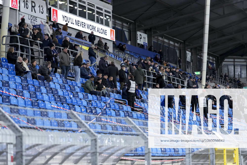 A view of the sparsely filled Walter Spagerer Grandstand, where the lower sections are cordoned off, SV Waldhof Mannheim’s fan section at the Carl Benz Stadium following the partial spectator ban imposed by the DFB and the Sports Court; fewer spectators, half-empty stands, cordoned-off area, ban as a penalty against the club, Spectator ban following the riots in the DFB Cup match against 1. FC Kaiserslautern, ruling after the cup match, fans, audience, spectators, lack of excitement, little atmosphere, stadium, symbolic photo, symbolic image, symbol, October 25, 2026, Mannheim, Germany, soccer, 3rd Division, SV Waldhof Mannheim vs. TSG 1899 Hoffenheim II, DFB and DFL regulations prohibit any use of photographs as image sequences and or quasi-video