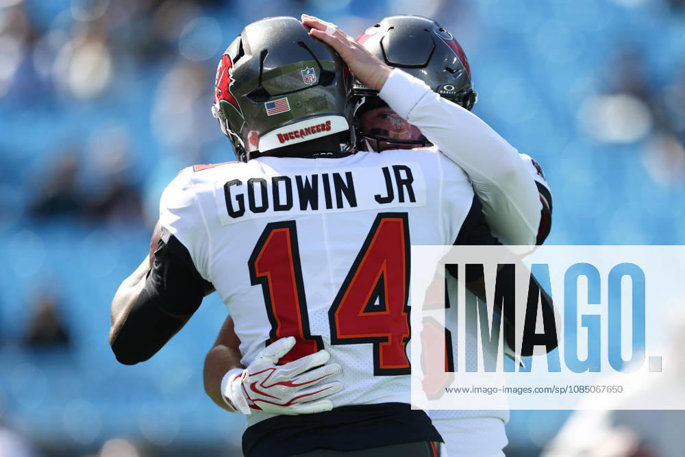 Oct 25, 2026; Charlotte, NC, USA; Tampa Bay Buccaneers quarterback Baker Mayfield (6) and wide receiver Chris Godwin Jr. (14) embrace before the game against the Carolina Panthers at Bank of America Stadium. Mandatory Credit: -Cal Media NFL, American Football Herren, USA 2026: Buccaneers Vs Panthers OCT 25 - ZUMAc04_ 20261025_zma_c04_064