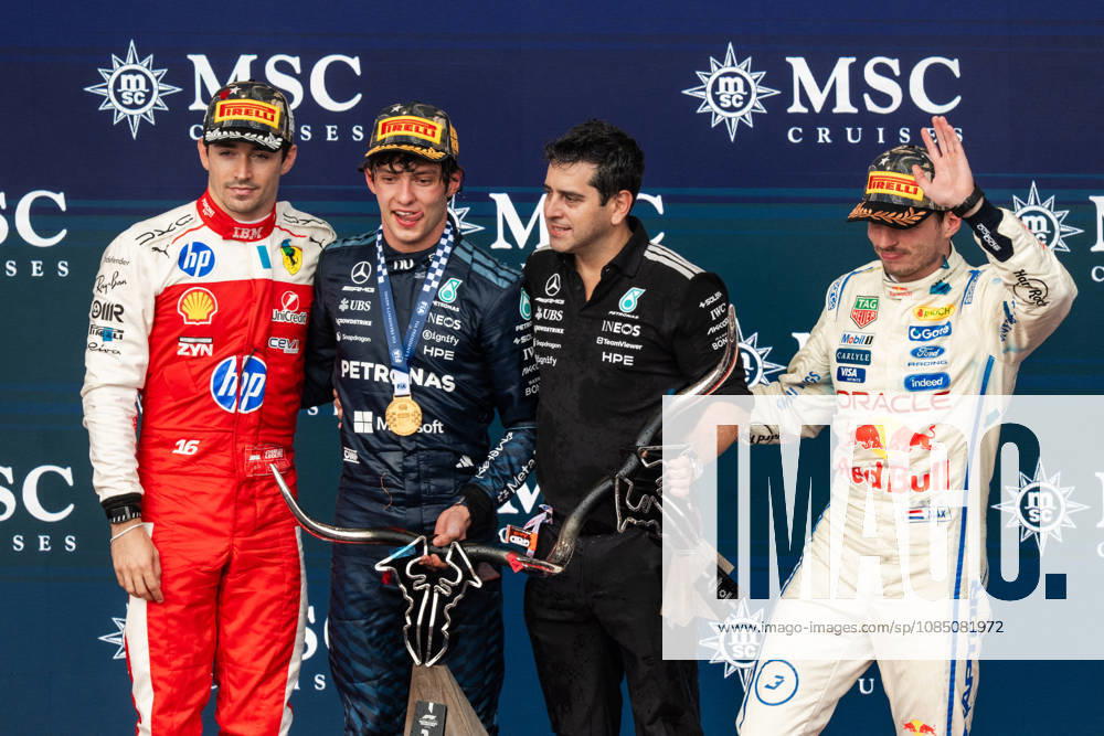 United States Grand Prix Podium - Austin Ferrari driver Charles Leclerc (16), Mercedes driver Andrea Kimi Antonelli (12), Mercedes Chief of Aerodynamic Technology Pierluigi Orsi and Red Bull Racing driver Max Verstappen (3) on the podium at the conclusion of the United States Formula One Grand Prix at the Circuit of the Americas in Austin, Texas, on October 25, 2026. Photo by Alexis Jumeau ABACAPRESS.COM Austin Texas