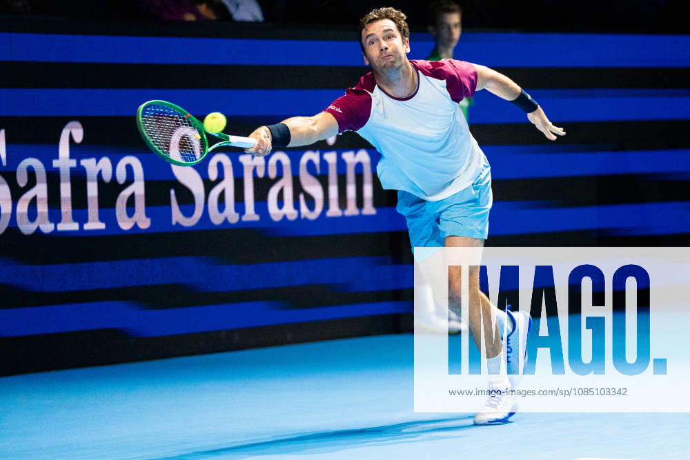 BASEL, SWITZERLAND, OCTOBER 26 — Quentin Halys of France stretches to hit a backhand against Holger Rune of Denmark during Day 3 of the Swiss Indoors Basel at St. Jakobshalle on October 26, 2026, in Basel, Switzerland