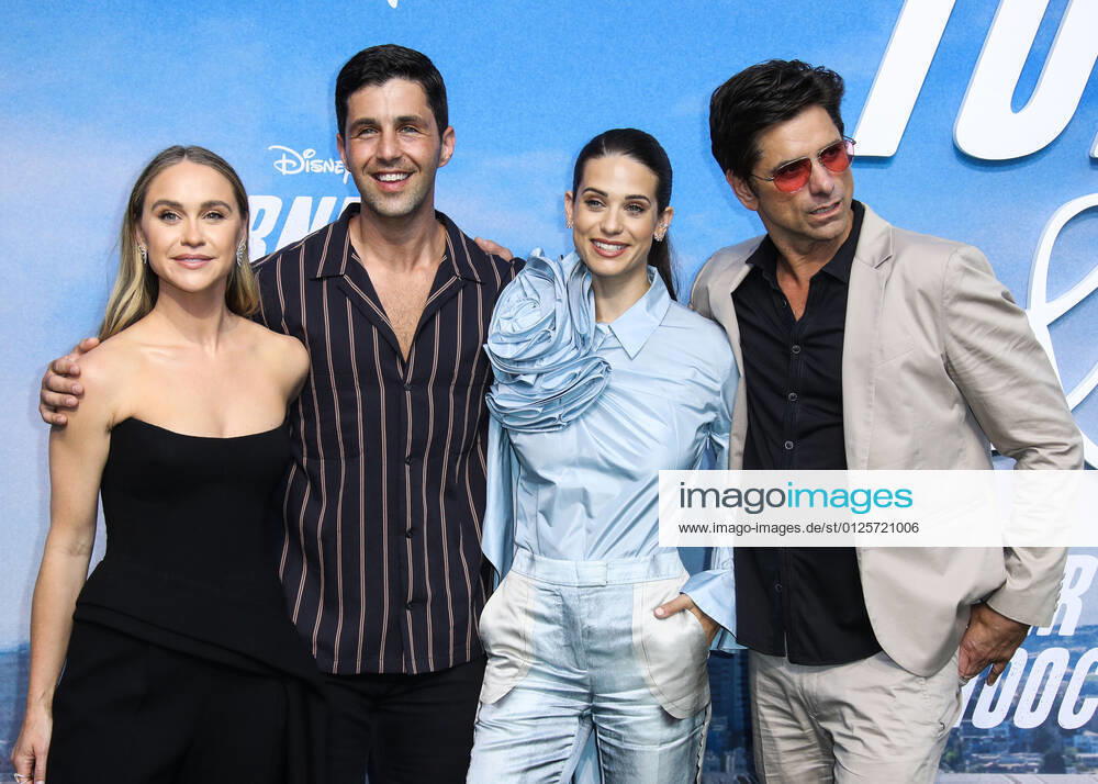 Disney+ Turner & Hooch Los Angeles Premiere Event CENTURY CITY, LOS ANGELES, CALIFORNIA, USA - JULY 15: Actors Becca Tobin, Josh Peck, Lyndsy Fonseca and John Stamos arrive at the Disney+ Turner & Hooch Los Angeles Premiere Event held at the Westfield Century City Mall on July 15, 2021 in Century City, Los Angeles, California, United States. Los Angeles California United States collin-disneytu210715_np53M