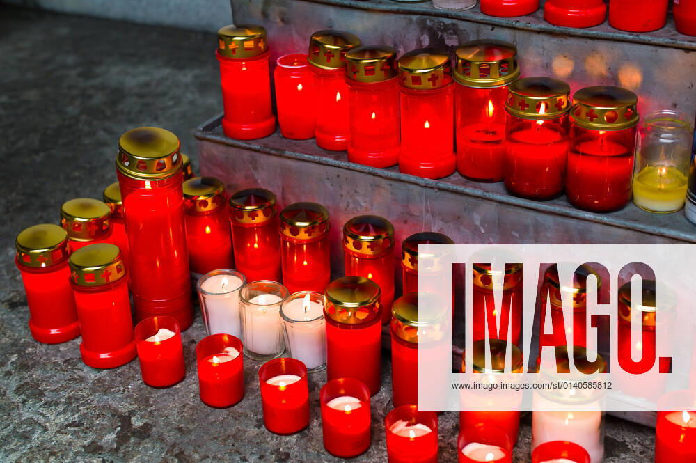 Many grave lights on All Saints Day shine in a cemetery McPBBO McPBBO
