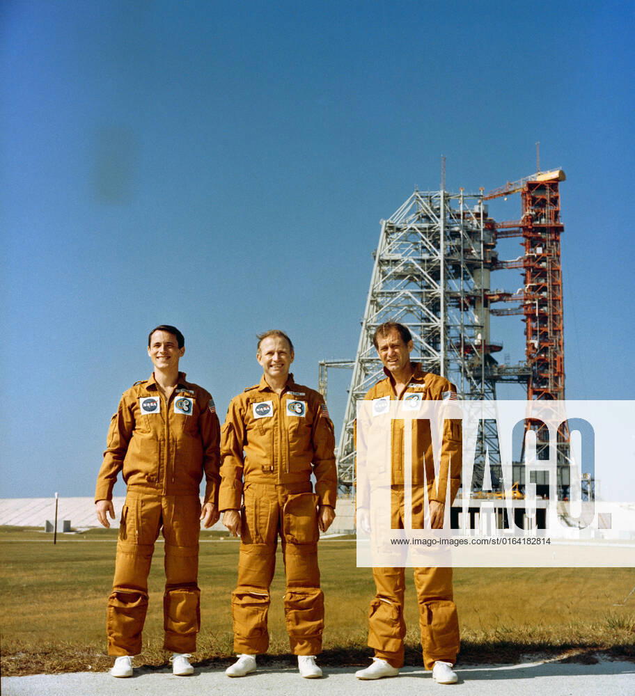 S73-36904 (8 Nov. 1973) --- The three members of the Skylab 4 crew are photographed standing near Pad B, Launch Complex 39, Kennedy Space Cneter, Florida, during the preflight activity. They are, left to right, scientist-astronaut Edward G. Gibson, science pilot; astronaut Gerald P. Carr, commander; and astronaut William R. Pogue, pilot.