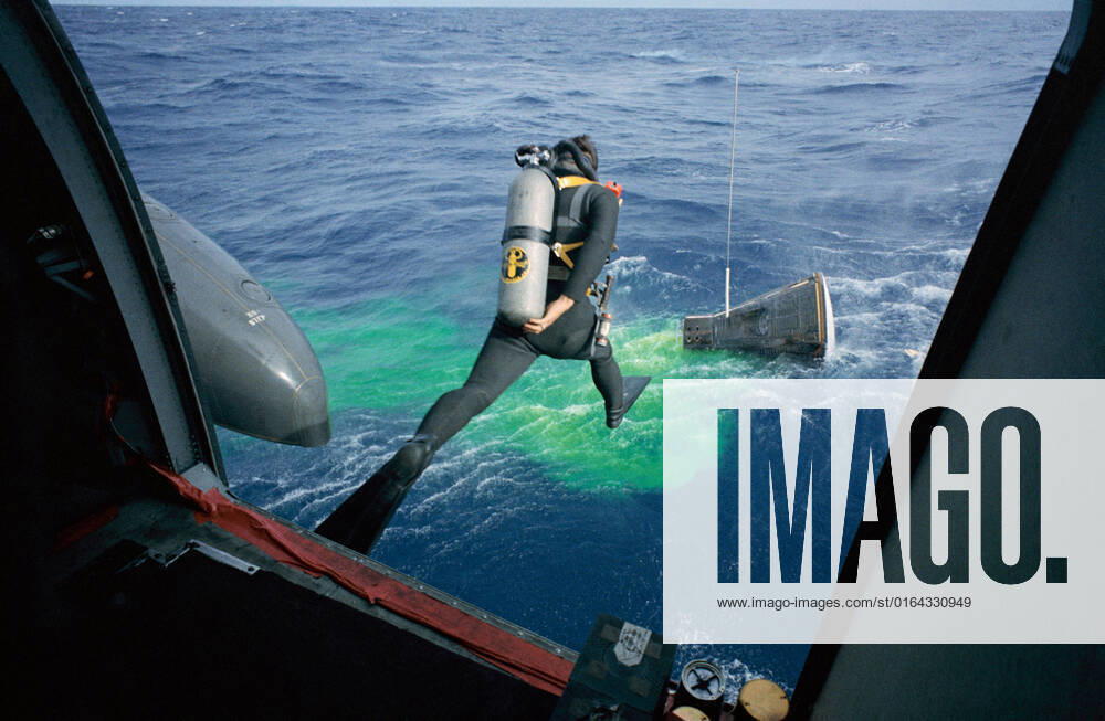 S66-59987 (15 Nov. 1966) --- A Navy frogman leaps from a recovery helicopter into the water to assist in the Gemini-12 recovery operations. Astronauts James A. Lovell Jr., command pilot, and Edwin E. Aldrin Jr., pilot, had just completed their four-day space mission.