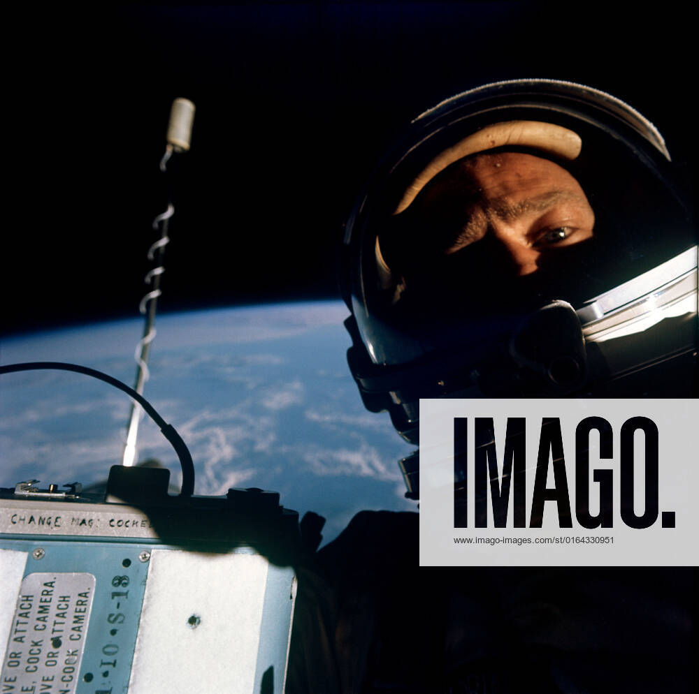 S66-62926 (12 Nov. 1966) --- Astronaut Edwin E. Aldrin Jr., pilot of the Gemini-12 spaceflight, is photographed with pilot s hatch of the spacecraft open. Note J.A. Maurer camera which was used to photograph some of his extravehicular activity (EVA). Astronaut James A. Lovell Jr. was the command pilot.