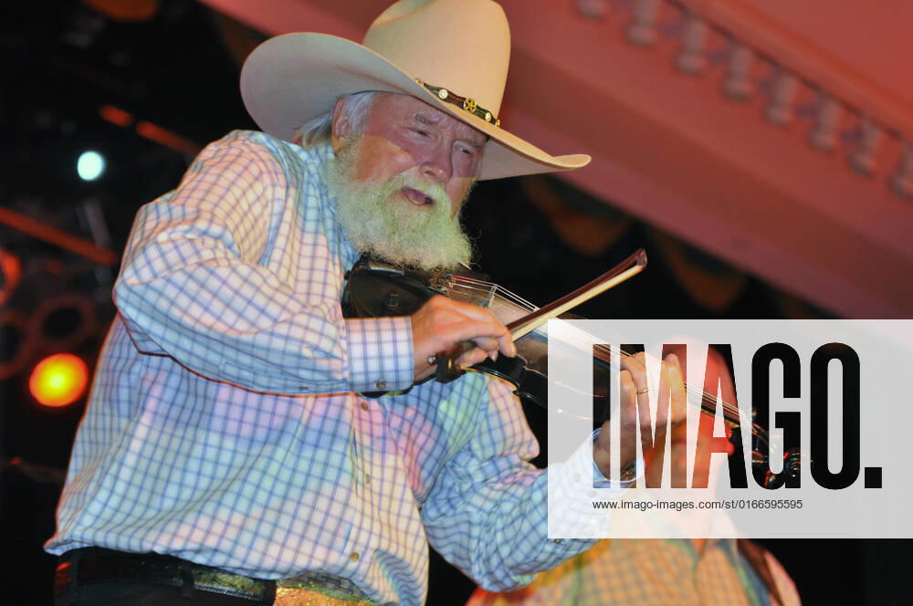 Charlie Daniels, 72, plays The Devil Went Down to Georgia at the opening of the 131st National Guard Association of the United States General Conference in Nashville, Tenn., on Sept. 11, 2009. On the eighth anniversary of the terrorist attacks of 2001, Daniels gave tribute to servicemembers serving at home and overseas.