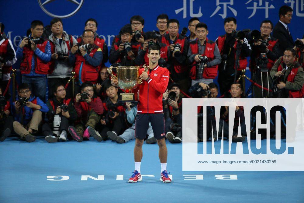 (151011) -- BEIJING, Oct. 11, 2015 -- Novak Djokovic of Serbia poses with his champion trophy during the awarding ceremony for the men s singles final at 2015 China Open Tennis Tournament in Beijing, China, Oct. 11, 2015. Djokovic claimed the title of the event after beating Rafael Nadal of Spain 2-0. ) (SP)CHINA-BEIJING-TENNIS-CHINA OPEN-MEN S SINGLES-FINAL XingxGuangli
